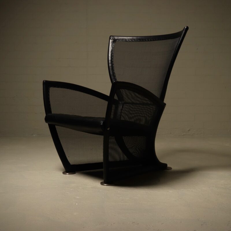 Lounge chair model 'Privé' designed by Paolo Nava for Arflex in the early 1980s. This piece exemplifies an experimental approach, combining innovative materials with a refined post modern design.
